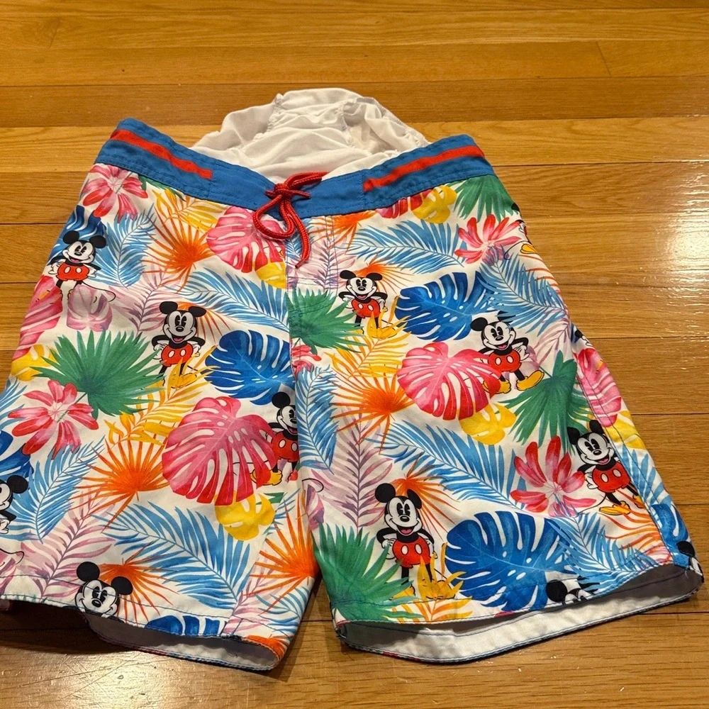 Disney store men’s swim shorts size small ,